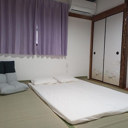 Lucky House Guest House Osaka Bagian luar foto
