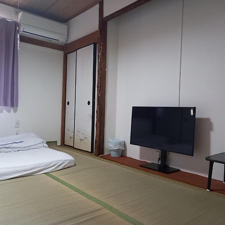 Lucky House Guest House Osaka Bagian luar foto