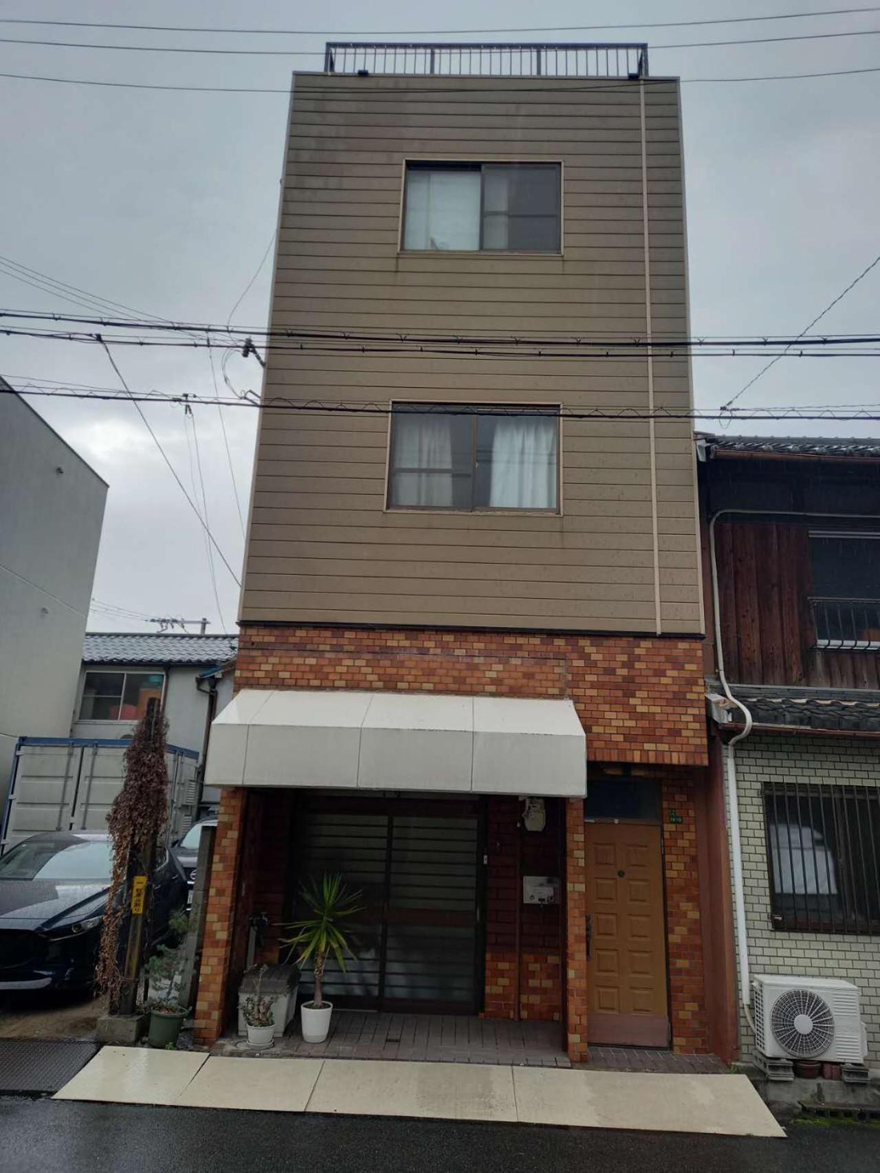 Lucky House Guest House Osaka Bagian luar foto